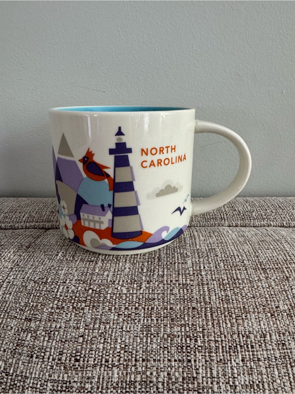 Starbucks North Carolina Ceramic Mug - White with Purple, Blue & Orange Accents